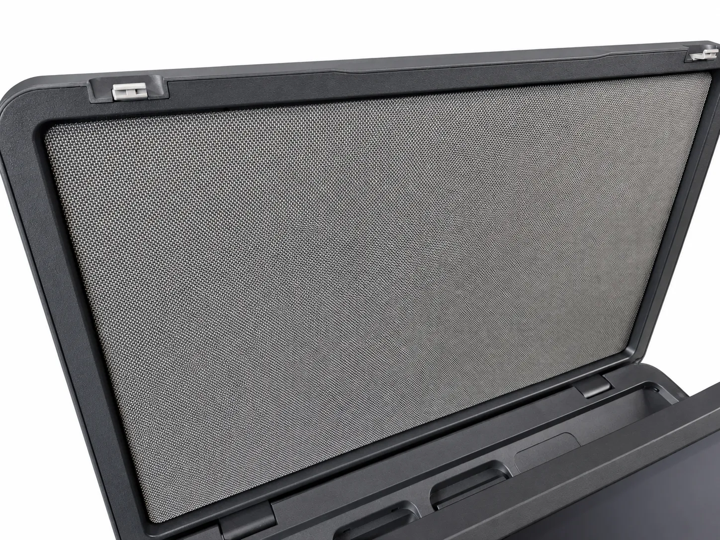 The open lid of AX-Core with the speaker mesh